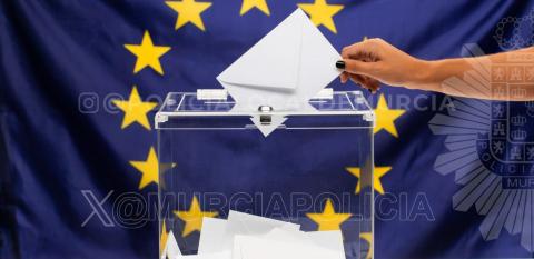 Voto depositándose en una urna con la bandera de europa de fondo